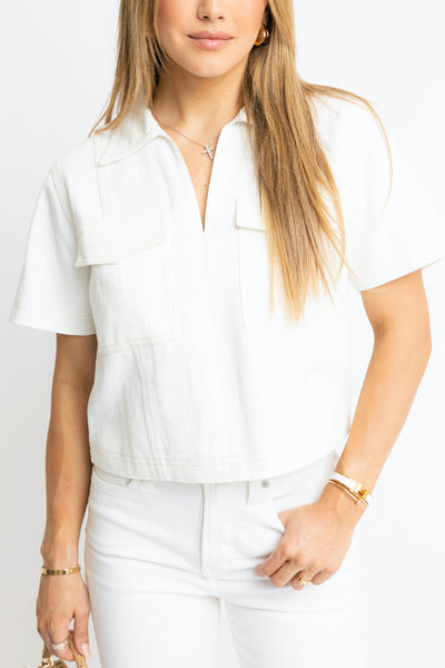 Denim pocket stitch top by KARLIE-K. Ellis Boutique